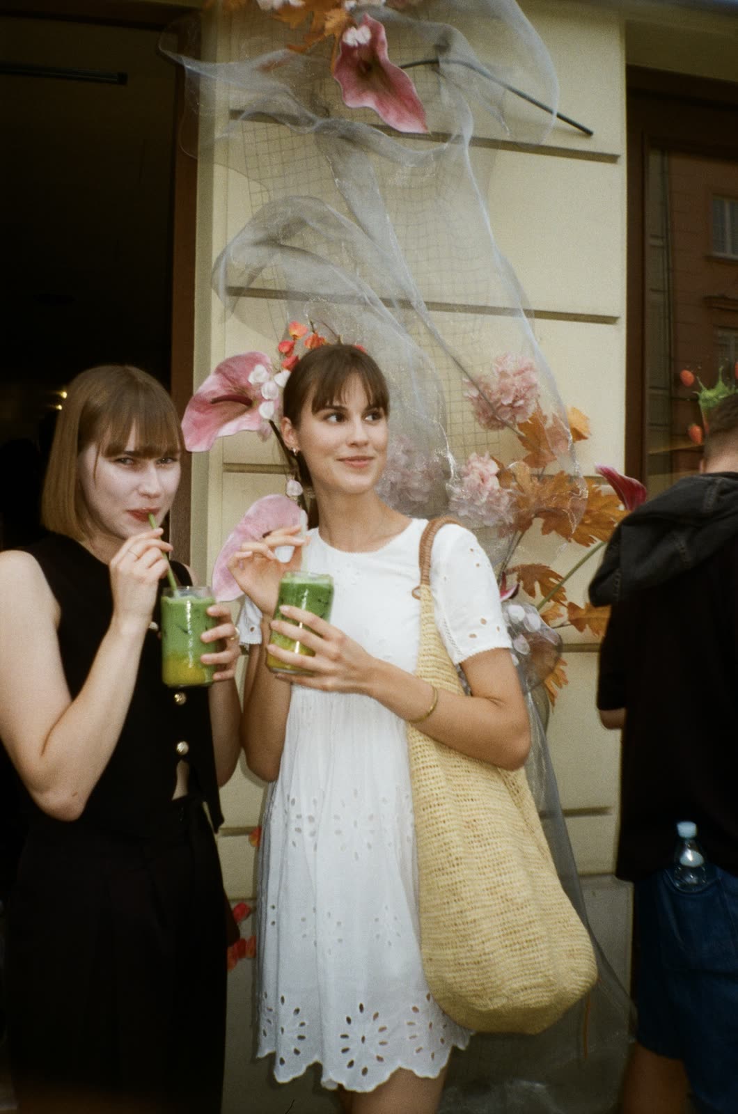 Friends holding matcha drinks